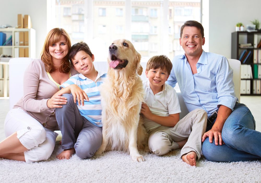 Family with a dog after a Local residential Carpet Cleaner serviced their East Brisbane home