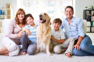 Family with a dog after a Local residential Carpet Cleaner serviced their East Brisbane home